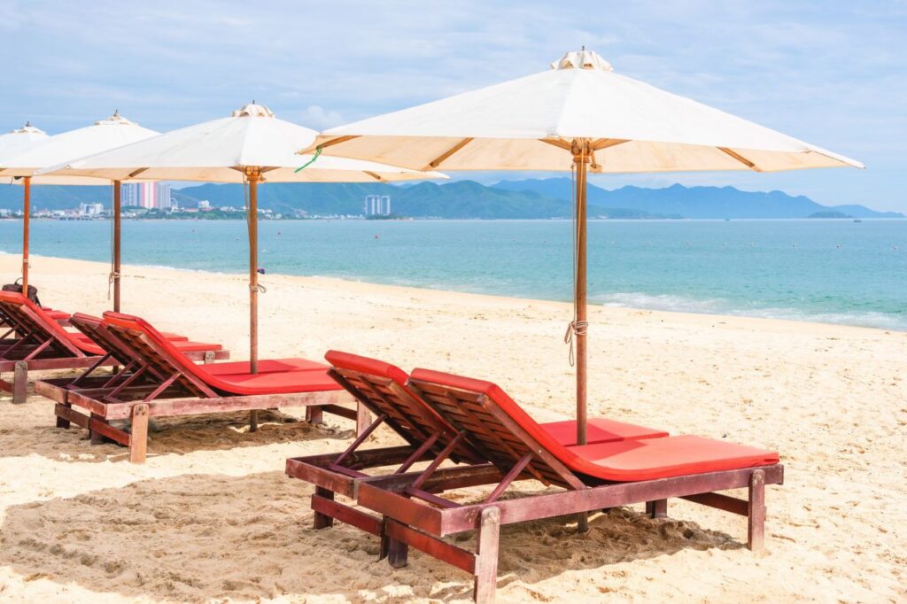 empty-beach-with-deck-chairs.jpg